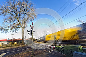 Freight train at a railroad crossing