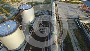 Freight train at the railroad shunting yard Aerial view. Stock. Freight train with oil. Flying above industrial railroad