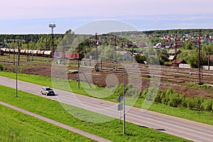 Freight train with tanks stand on railway station