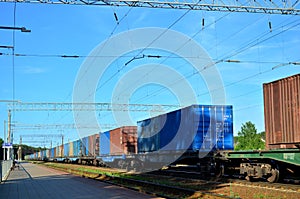 Freight train, transportation of railway cars by cargo containers shipping.