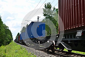 Freight train, transportation of railway cars by cargo containers shipping.