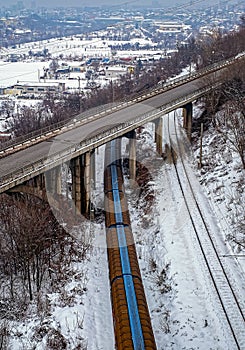 Freight train under the bridge