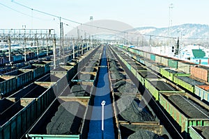 Freight trains with coal at marshalling yard