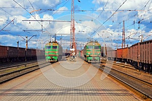 Freight trains passing station