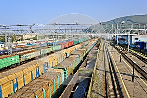 Freight trains at the railway sorting station. Rail Cargo transit.