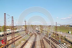 Freight trains at railway station with many railroads