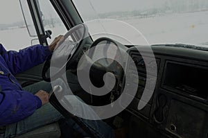 Freight Truck driver on a rural road transporting goods