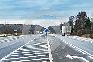 Freight truck moves fast on the highway