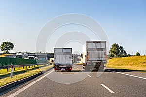 Freight trucks on a highway.