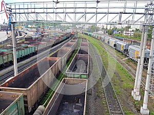 Freight wagons stand on railway tracks