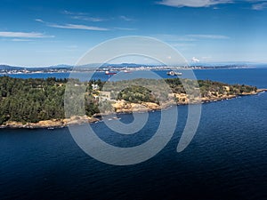 Freighters anchored off the Southern tip of Vancouver Island overlooking downtown Victoria British Columbia