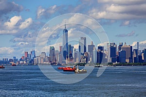 Freighters in Harbor with New York City in Background photo