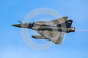 French Air Force Dassault Mirage 2000 fighter jet plane taking off from Leeuwarden Air Base. The Netherlands - April 19, 2018