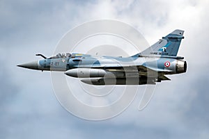 French Air Force Dassault Mirage 2000 fighter jet plane in flight over Florennes Air Base, Belgium - June 15, 2017