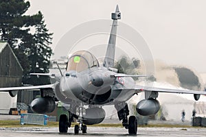 French Air Force Dassault Rafale fighter plane taxiing at Mont-De-Marsan airbase. France - May 17, 2019 photo