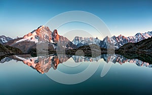 French alps landscape of Lac Blanc with Mont Blanc mountain range reflected on lake in the sunset at Chamonix, France