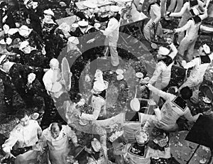 French and American sailors having food fight