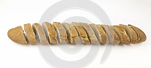 French baguette cut into pieces. Slices of bread are isolated on a white background. Bakery concept, design element.