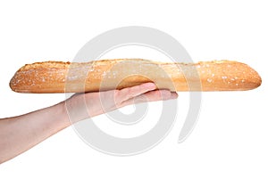 French Baguette in a human hand