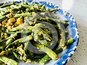 French Beans and Salted Duck Egg Yolks. Close up view.