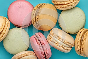French biscuit biscuits of different colors. Macaroons, close-up, studio shot.