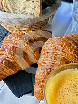 French breakfast at a cafe - croissants and orange juice