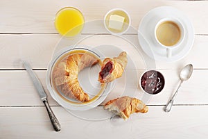French Breakfast - croissant, jam, butter, orange juice and coffee