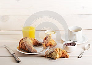 French Breakfast - croissant, jam, butter, orange juice and coffee