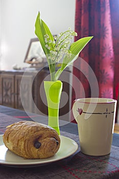 French breakfast with lily of the valley