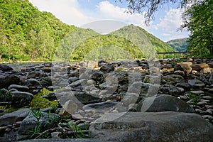 French Broad River with bridge in Appalachian Mountains near Hot Springs North Carolina