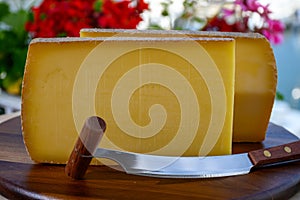 French cheese Comte, three varieties 1 year matured Prestige, fruity flavoured Fruite and Vieille Reserve close up