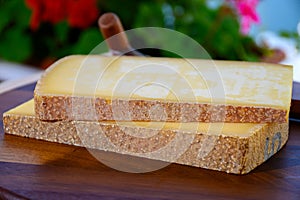 French cheese Comte, three varieties 1 year matured Prestige, fruity flavoured Fruite and Vieille Reserve close up