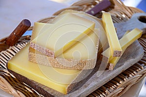 French cheese Comte, three varieties 1 year matured Prestige, fruity flavoured Fruite and Vieille Reserve close up