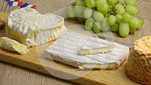 French cheese platter with four different types of cheese close up