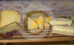 French cheese platter Tomme, ComtÃÂ© and Brique de loubressac photo