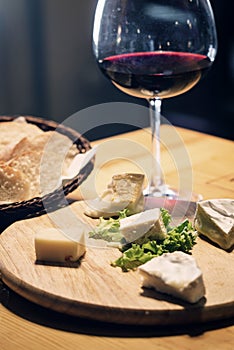 French cheese red wine and bread platter