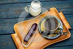 French coffee with cream and Eclair