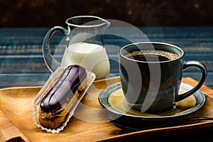 French coffee with cream and Eclair