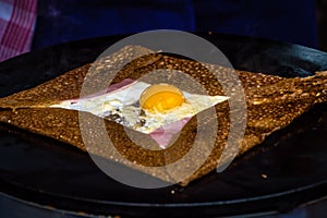 French crepe with egg, ham and cheese