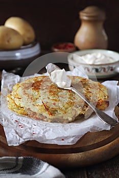 French cuisine. Pomme darphin: roasted pancakes from grated potatoes