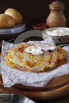 French cuisine. Pomme darphin: roasted pancakes from raw grated