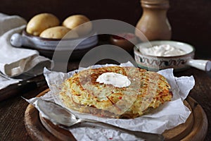 French cuisine. Pomme darphin: roasted pancakes from raw grated potatoes