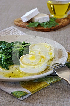French cuisine: Warm goat cheese with greens