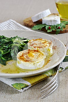 French cuisine: Warm goat cheese with herbs