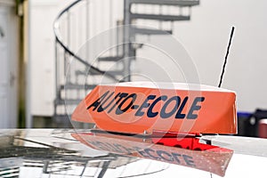French driving school light panel on car roof in french auto ecole