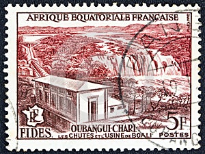 FRENCH EQUATORIAL AFRICA - CIRCA 1956: A stamp printed in France shows Boali waterfall and power station, circa 1956.