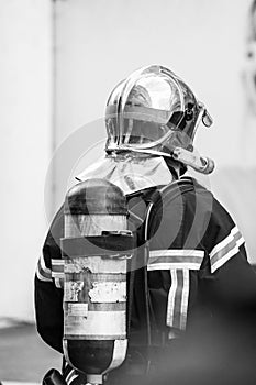 French fireman on backview in the street