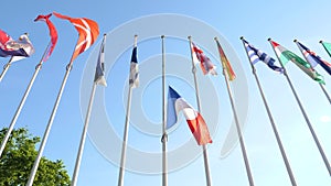 French flag half mast waving in tribute to UK Manchester attack