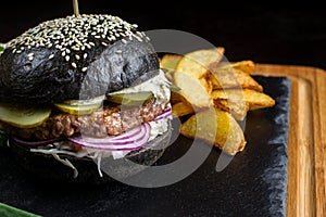 French fries in the background hamburger. photo