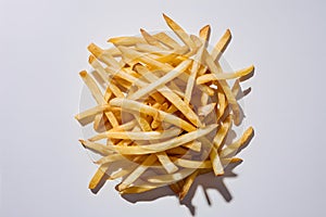French fries creatively showcased against a white background